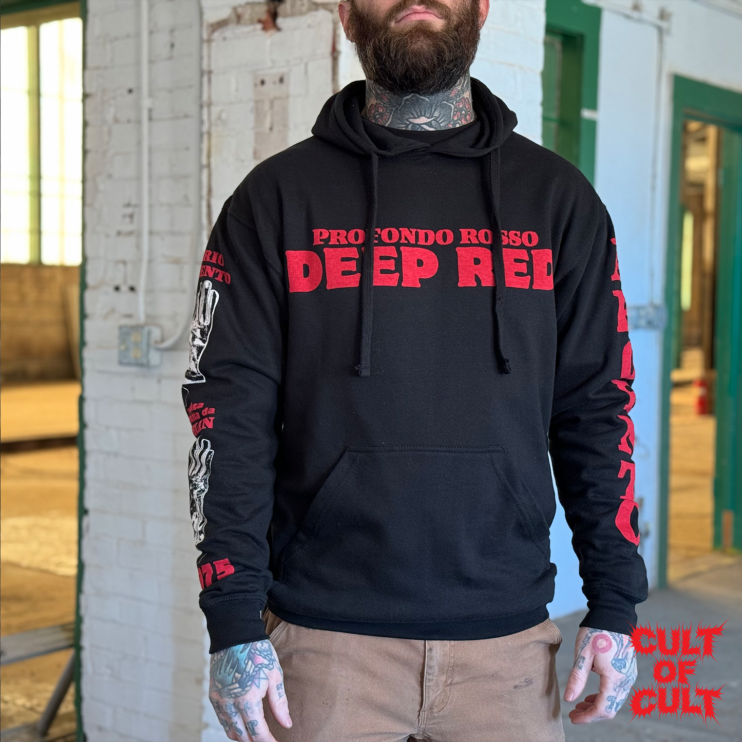 A model wearing the Deep Red Profondo Rosso hoodie, pictured from the front.