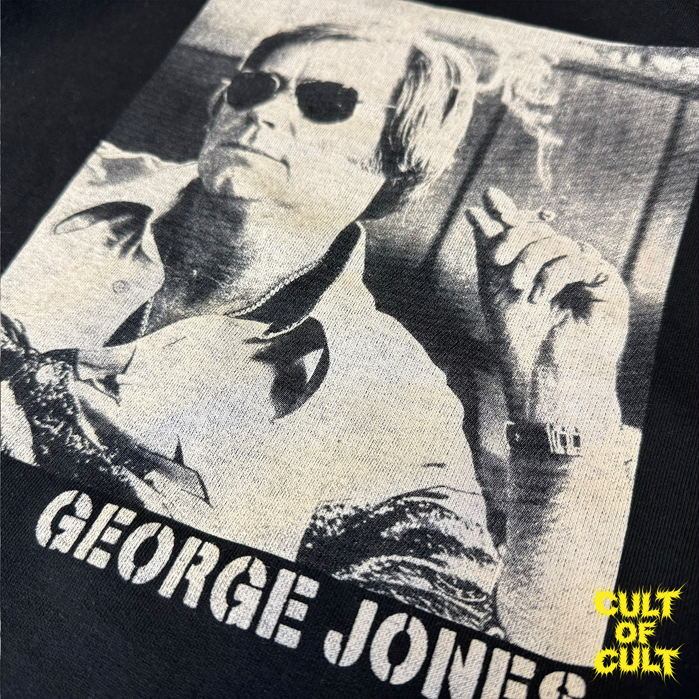 A detailed image of the photo of George Jones that is on the back of the hoodie