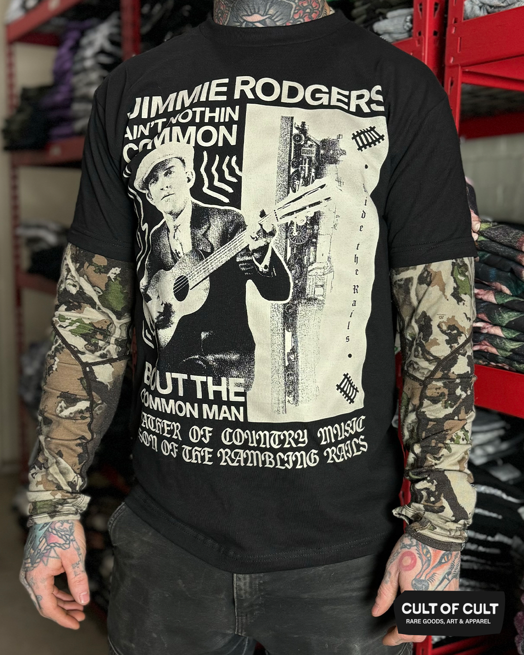 a model wearing the Jimmie Rodgers black short sleeve shirt