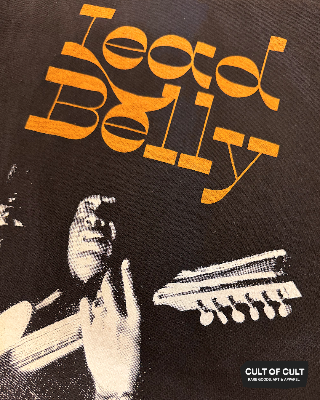 a detailed close up view of the black long sleeve Lead Belly shirt