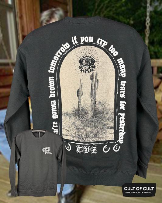 A detailed view of the back and the front of the Townes Van Zandt black crewneck sweatshirt