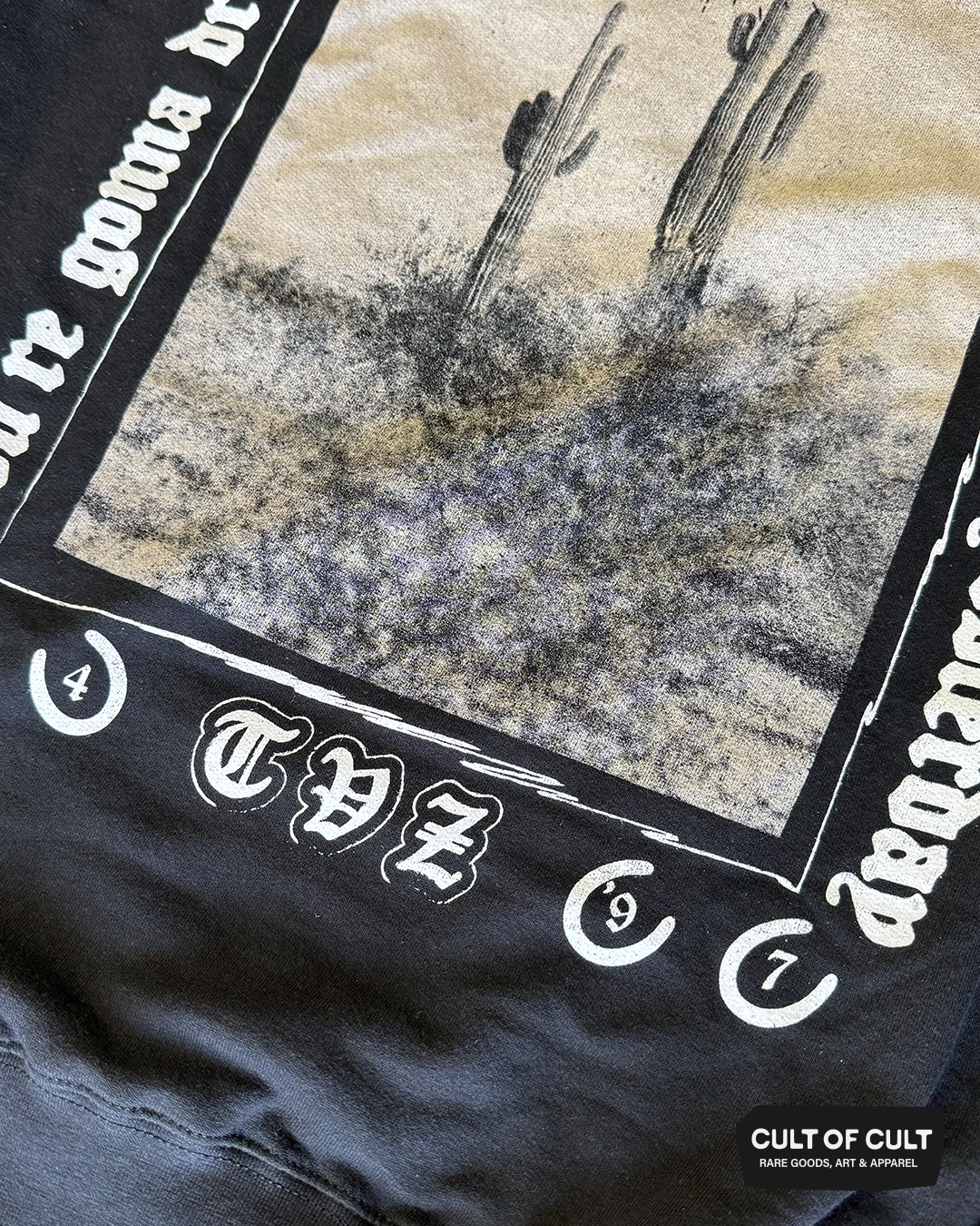 a close up view of the back of the Townes Van Zandt black crewneck sweatshirt