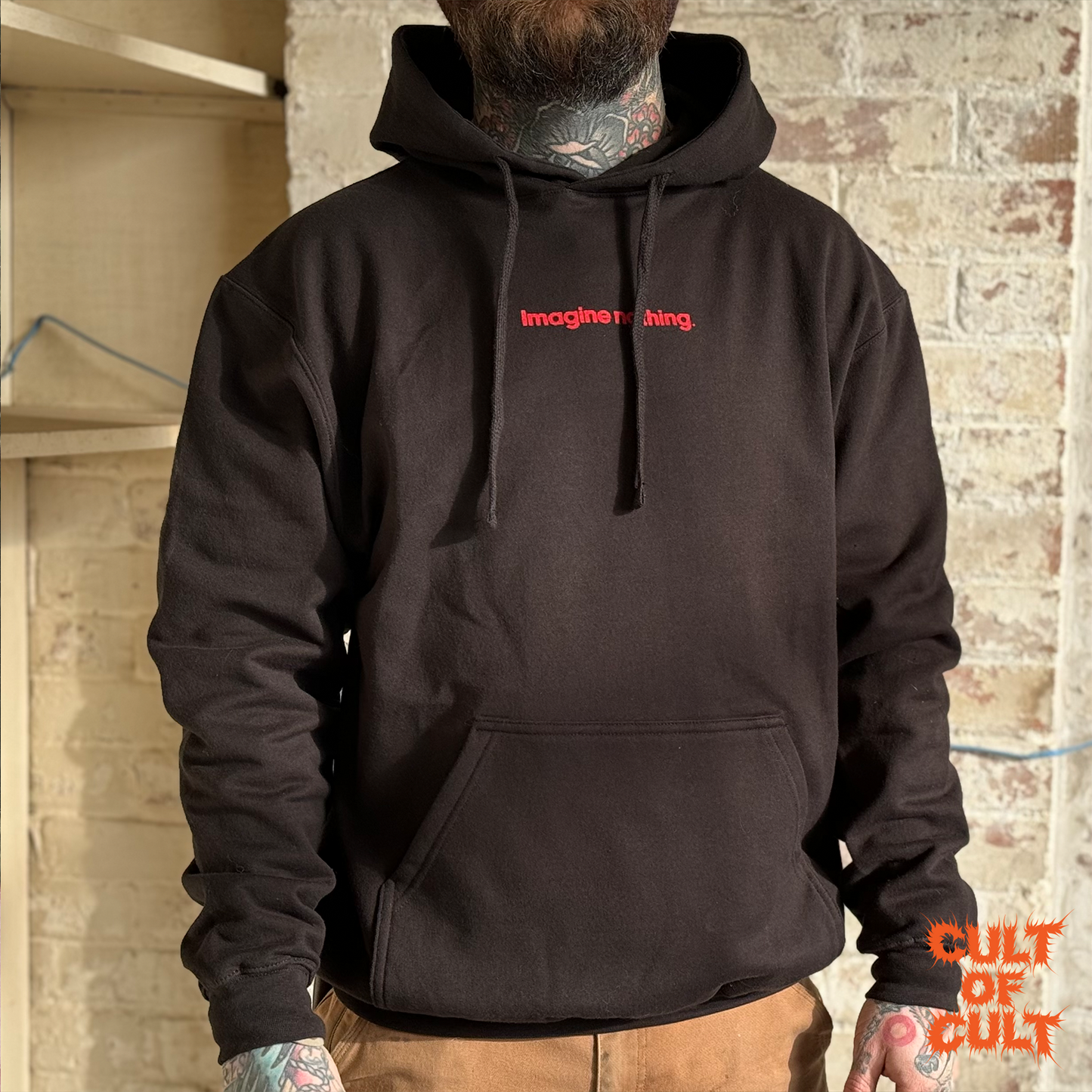 A model wearing a medium Oldboy 2003 hoodie