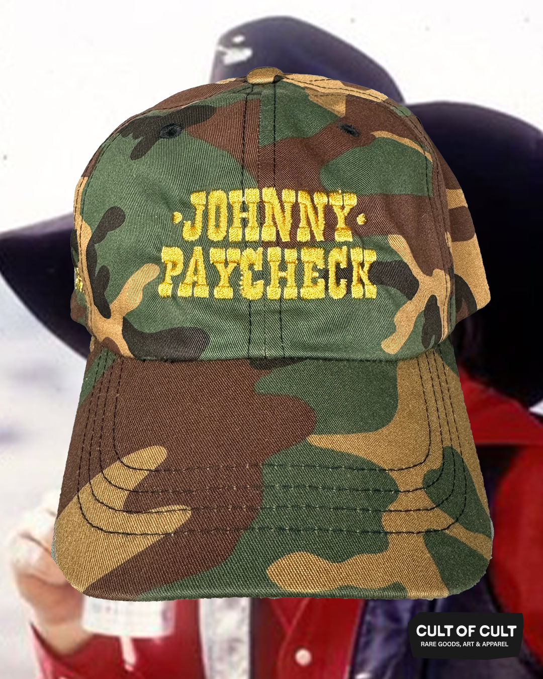 The front view of the camo Johnny Paycheck hat
