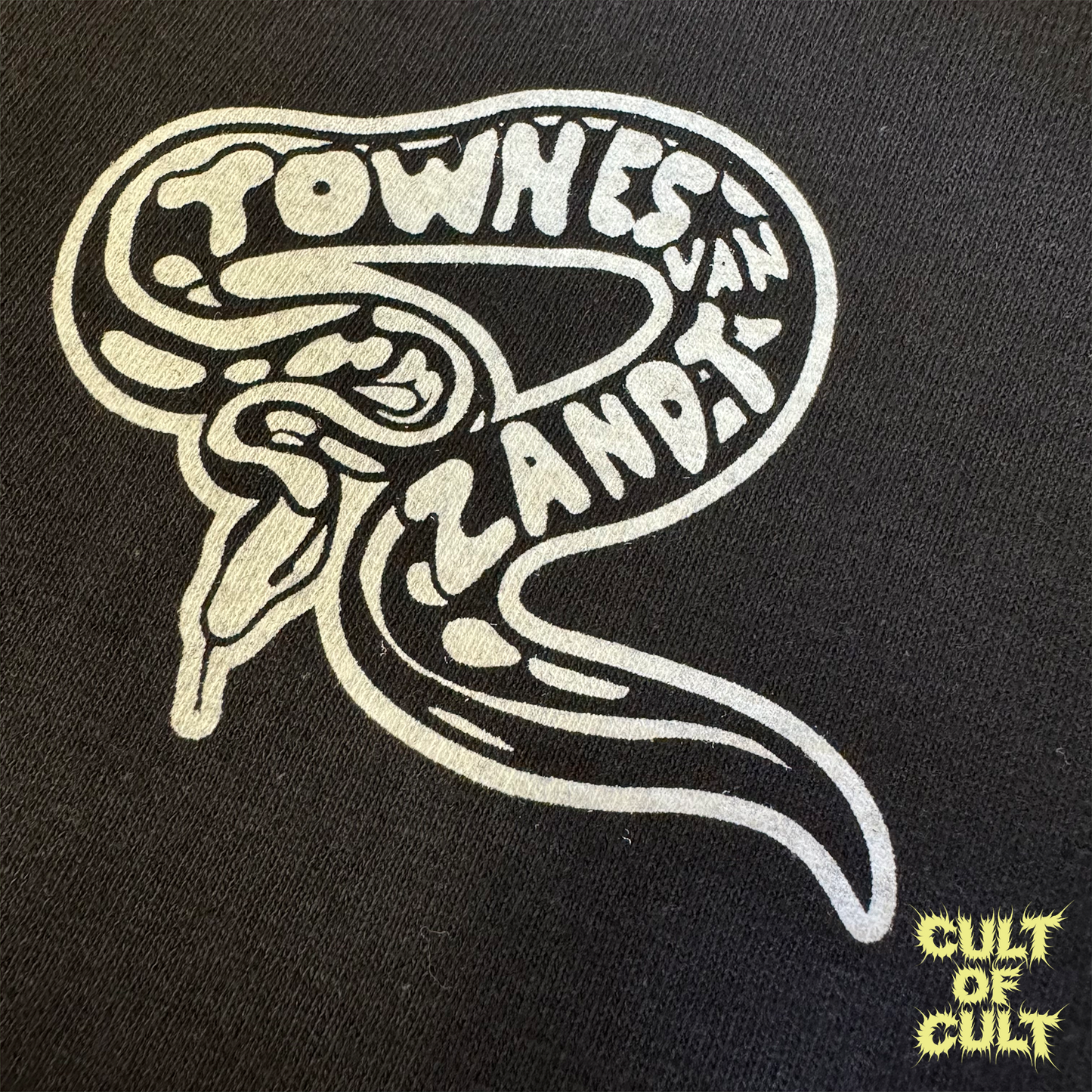 A zoomed in detail shot of the pocket print on the front of of the Townes Van Zandt short sleeve shirt