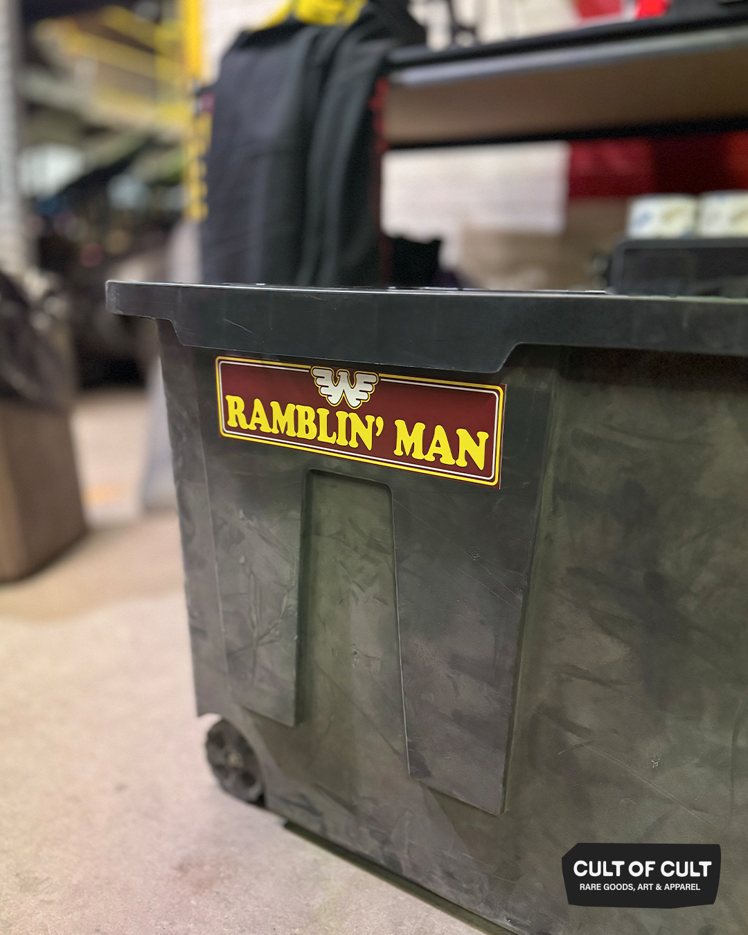 The Ramblin Man Waylon Jennings bumper sticker shown on a large black tote