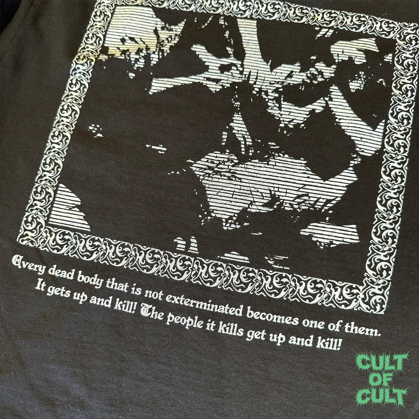 a zoomed in detailed photo of the back of the black Zombie Dawn of the Dead 1978 long sleeve shirt