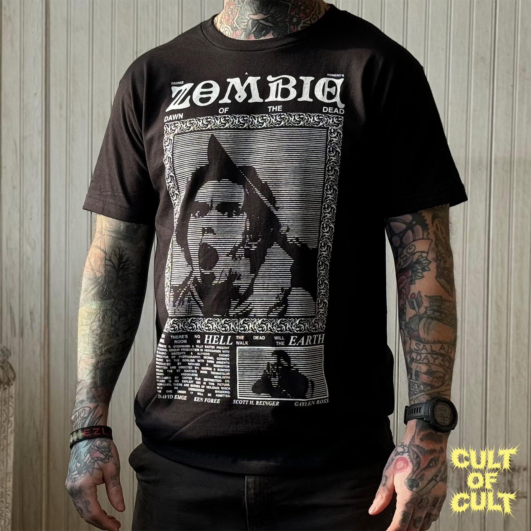 A model wearing the black Zombie Dawn of the Dead 1978 short sleeve shirt from the front